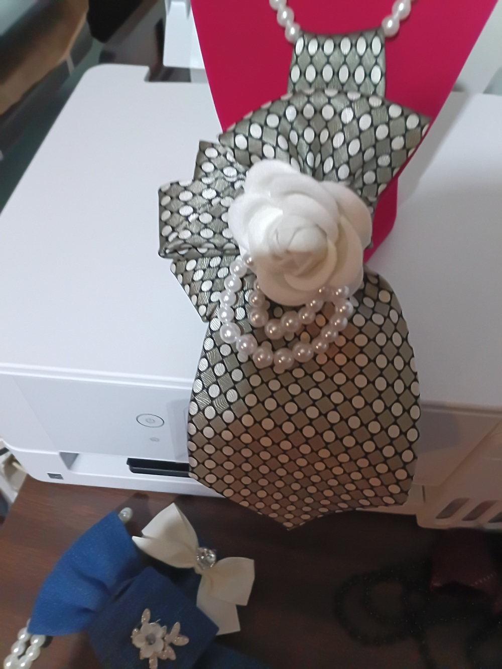 Elegant Pearl-Accent Floral Clutch in White and Black